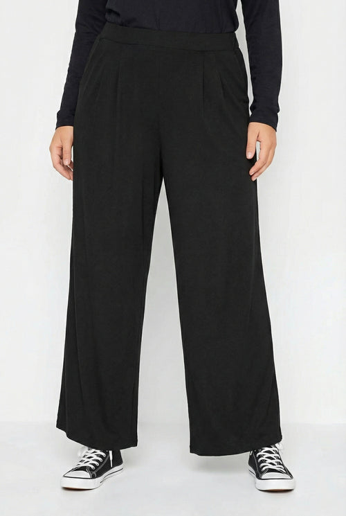 Beli Lastikli Cepli Geniş Paça Pantolon - Şık ve Rahat Tasarım